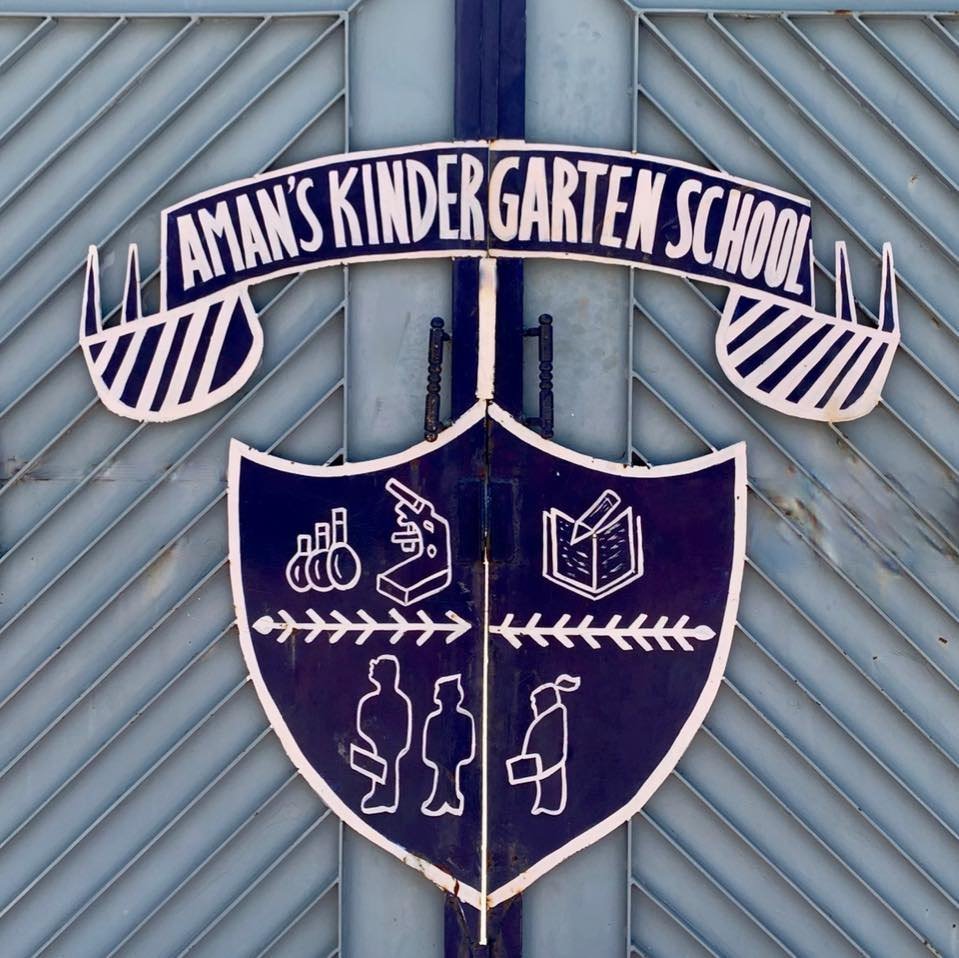 Aman Kindergarten School logo